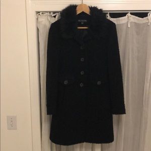 Wonderful, long winter coat with faux fur collar.